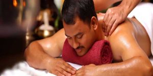 A Man experienced an oil massage by professional massage therapists.