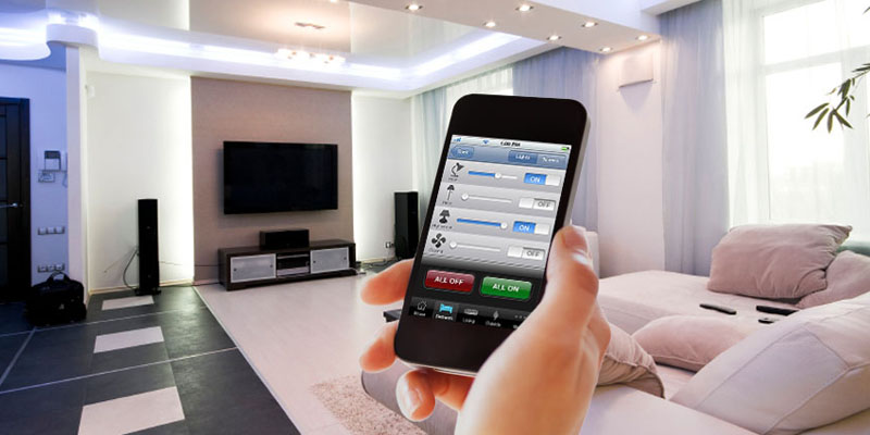 A Person controlling his home appliances by using an automated remote developed by leading Home Automation Company.